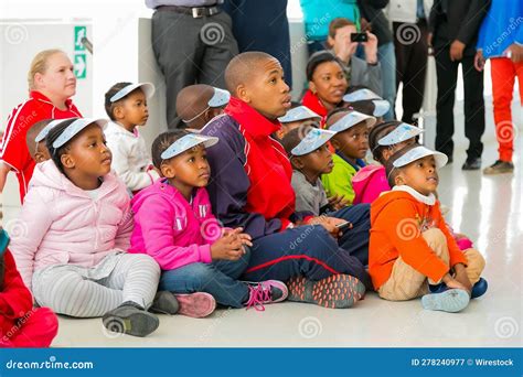 Group Of African Children Sitting Together At A Fun Event Editorial