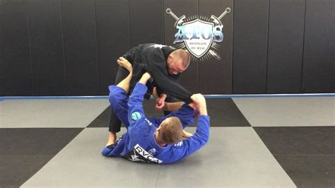 How to Do the Triangle Choke | MMA Fighting - Martial Arts Masters