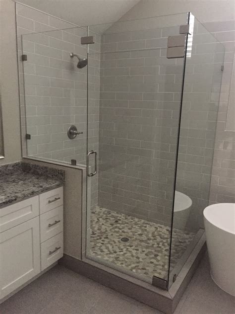 Elegant Frameless Shower Pebble Floors Dfw Bath And Glass