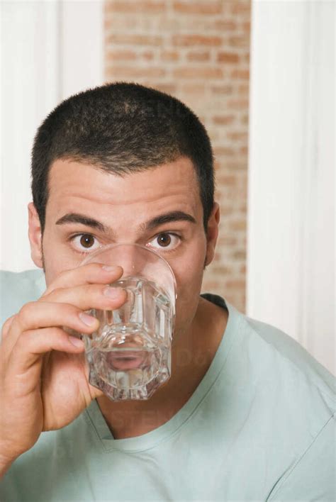 Man Drinking A Glass Of Water Portrait Nh Nico Hermann Westend