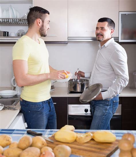 Two Men Cooking At Home Stock Photo Image Of Kitchen 80646298