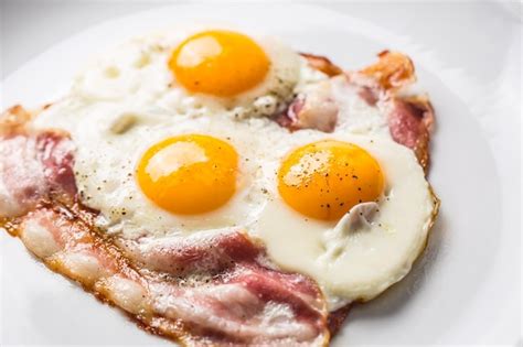 Premium Photo Ham And Eggs Bacon And Eggs Salted Egg With Pepper On