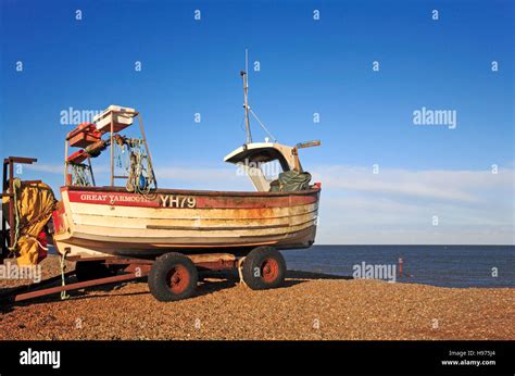 An Inshore Fishing Boat Beached On The Shingle Bank At Weybourne