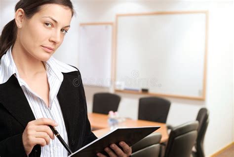 Pretty Young Business Woman Giving A Presentation Stock Photo Image