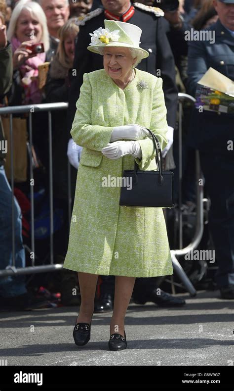 Queen Elizabeth Ii Meets Well Wishers During A Walkabout Close To