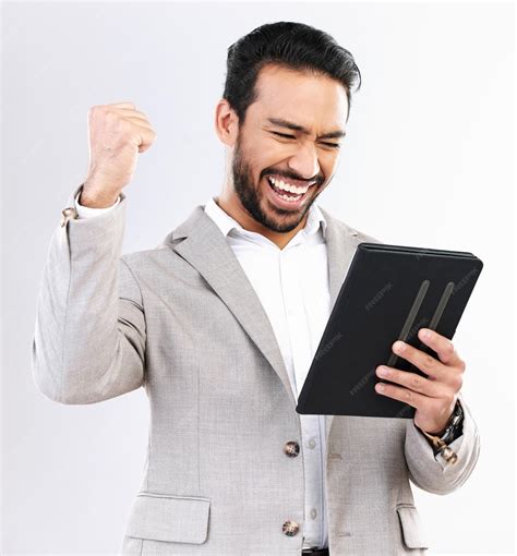 Premium Photo Tablet News And Business Man Celebrate Achievement