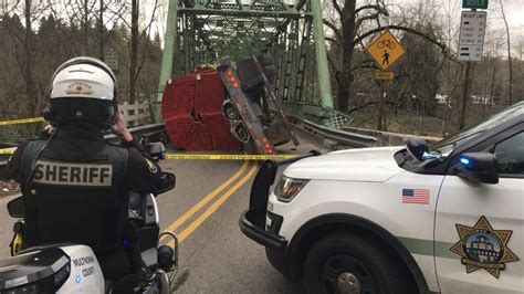 Troutdale Bridge reopens after semi hauling lumber tips over | KATU