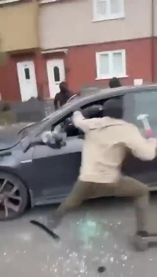 Terrifying Moment Driver Is Brutally Attacked By Masked Gang Armed With