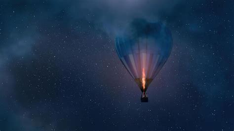 Premium Photo | A hot air balloon with a fire burning in the sky