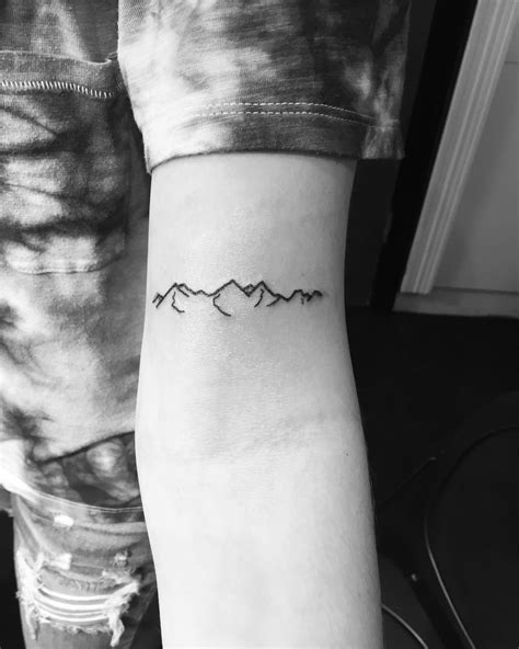 Mountain range outline tattoo | Minimal tattoo, Mountain range tattoo ...