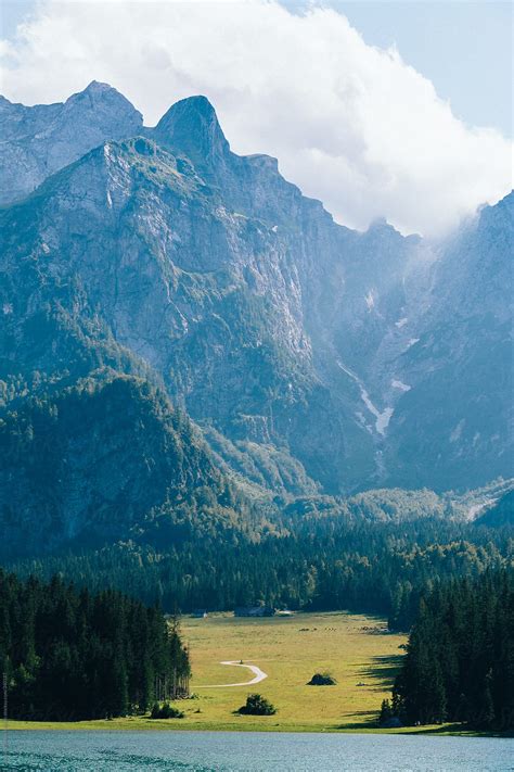 "Alpine Lake In Italy" by Stocksy Contributor "Vero." - Stocksy