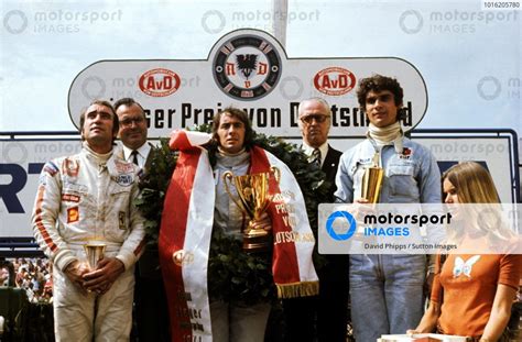 The Podium L To R Clay Regazzoni SUI Ferrari Third Jackie Stewart