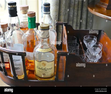 whisky bottles  glasses  home bar stock photo alamy