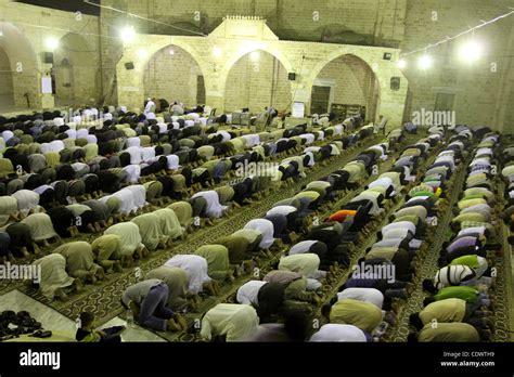 Palestinian Muslims Pray Al Taraweeh Prayer At Al Omari Mosque During