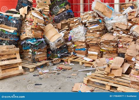 A Large Pile Of Cardboard Boxes From The Goods Sold Stored In The Back