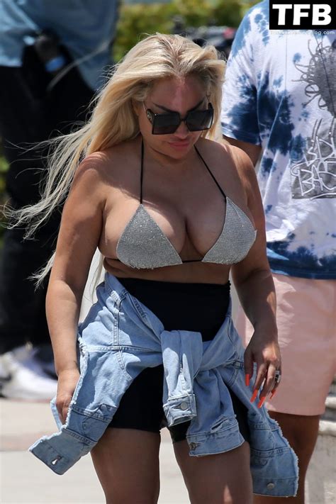 Darcey And Stacey Silva Show Off Their Curves In Tiny Bikini Tops As They Film A Scene In Miami