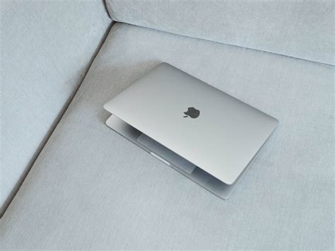 Download Sleek Minimalist MacBook Pro Setup Wallpaper | Wallpapers.com