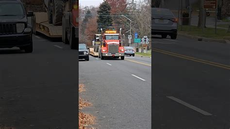 County Concrete Kenworth Pulling A CAT TH62 Telespcopic Forklift GMC