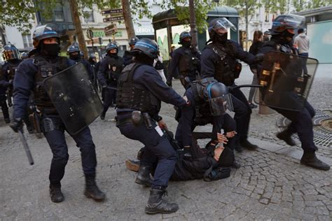 Watch: Macron Victory Triggers Protests, Tear Gas on the Streets of ...