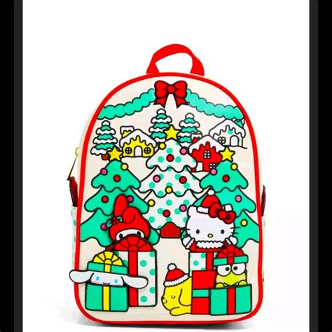 A Hello Kitty Backpack With Christmas Trees And Presents On The Front Sitting Against A White