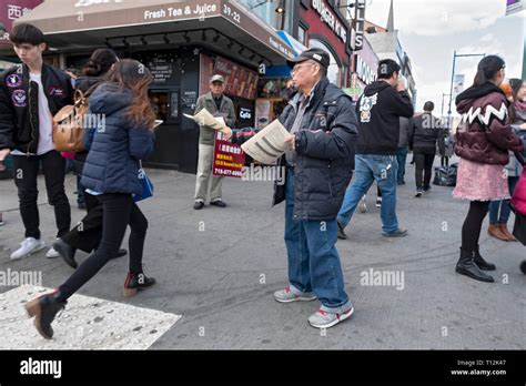 Man handing out flyers hi-res stock photography and images - Alamy