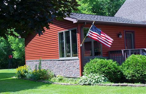 Red Alside Siding And Exteria Vinyl Brick Siding On This Manitowoc Wisconsin Home Brick