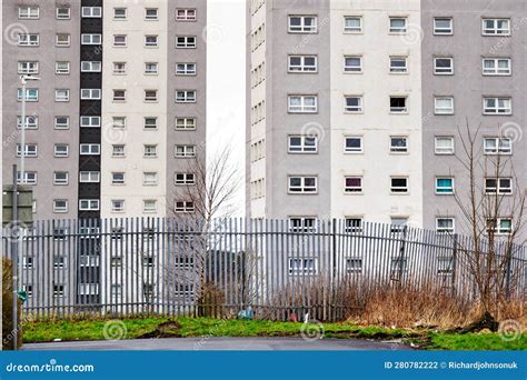 High Rise Council Flats In Poor Housing Estate And Empty Play Area