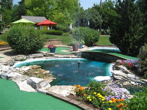 Pond And Fountain In The Center Of Our Landscaped Mini Golf Course