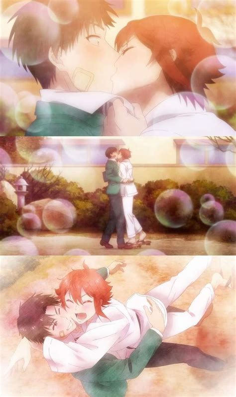 Two Anime Characters Are Kissing In Front Of Bubbles