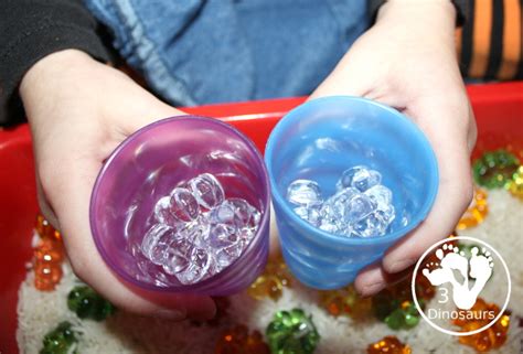 Pumpkin Sensory Bin With Rice 3 Dinosaurs