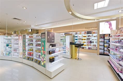 Elegant Cosmetic Skincare Shop Display Retail Showcase With Acrylic Logo