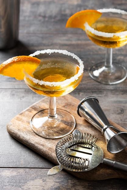 Premium Photo Sidecar Cocktail With A Sugar Rim On Wood