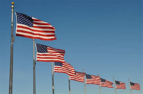 American Flag Waving In The Wind Photograph By Brandon Bourdages Pixels