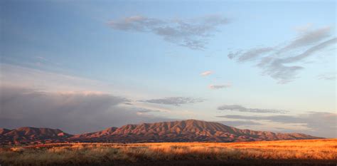 Curve Road Near Mountains during Daytime · Free Stock Photo