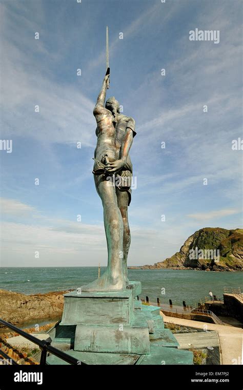 Photos of Damien Hirst's Verity Ilfracombe Harbour Verity stands on the pier at the entrance to ...