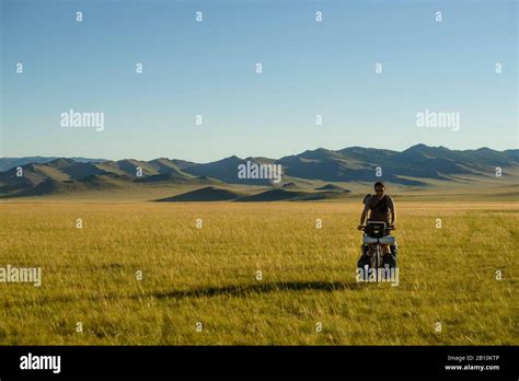 Cycling In The Mongolian Steppe Mongolia Stock Photo Alamy