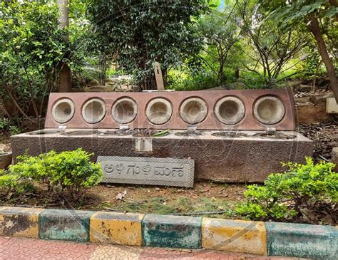 Image of Huge Rock Or Stone Ali Guli Mane Or Pallanguzhi Strategy Board Indian Game In A Park Of ...