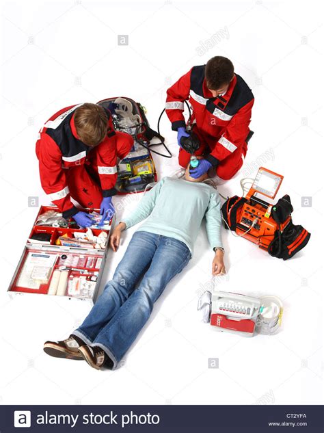 Fire Service Paramedics With Emergency Equipment Stock Photo Alamy