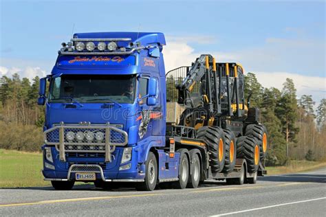 Volvo FH Truck Hauls Ponsse Forest Harvester Editorial Stock Photo