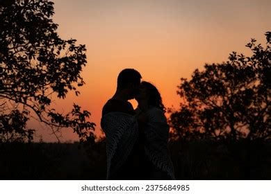 Silhouette Couple Kissing Sunset Stock Photo 2375684985 | Shutterstock