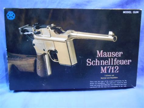 【目立った傷や汚れなし】マルシン モーゼル M712 エングレーブ モデル 彫刻入 木製グリップ付 未発火 金属製モデルガン Smg 合法品の