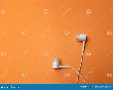 Copy Space White Headphonesearphoneearbuds With Headset On Isolated