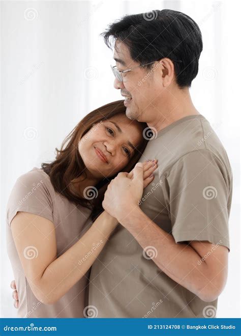 Half Body Horizontal Portrait Shot Of Cute Smiling Senior Asian Lover