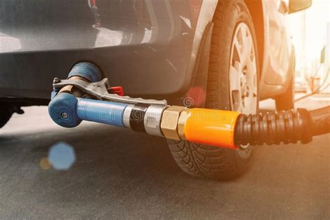 Pumping Gas Fuel Car At Oil Station Woman Hand Refuel Petrol Nozzle