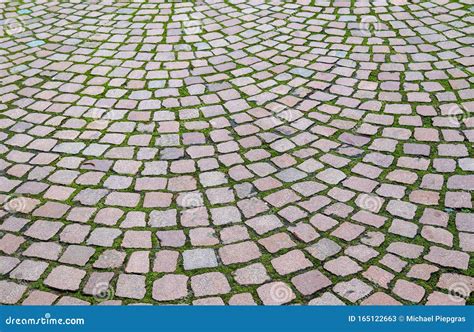 Detailed Close Up View On Cobblestone Streets And Sidewalks In High