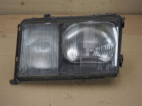 REFLEKTOR LAMPA LEWA PRZÓD MERCEDES W124 HELLA 12957900 za 189 zł z