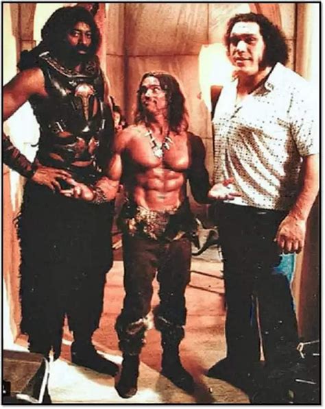 This is what Arnold Schwarzenegger looked like as he was standing in between Wilt Chamberlain ...