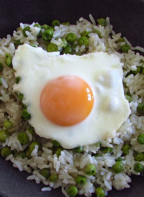 Rice And Peas With Poached Eggs Recipe Food From Portugal