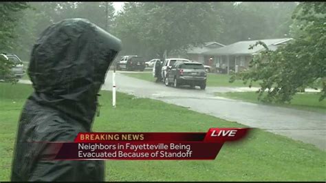 Swat Team Police Surround Home In Fayetteville During Standoff