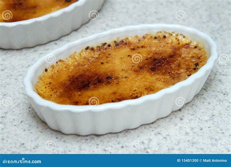 Two Ramekins of Creme Brulee Stock Photo - Image of delicious, gourmet ...